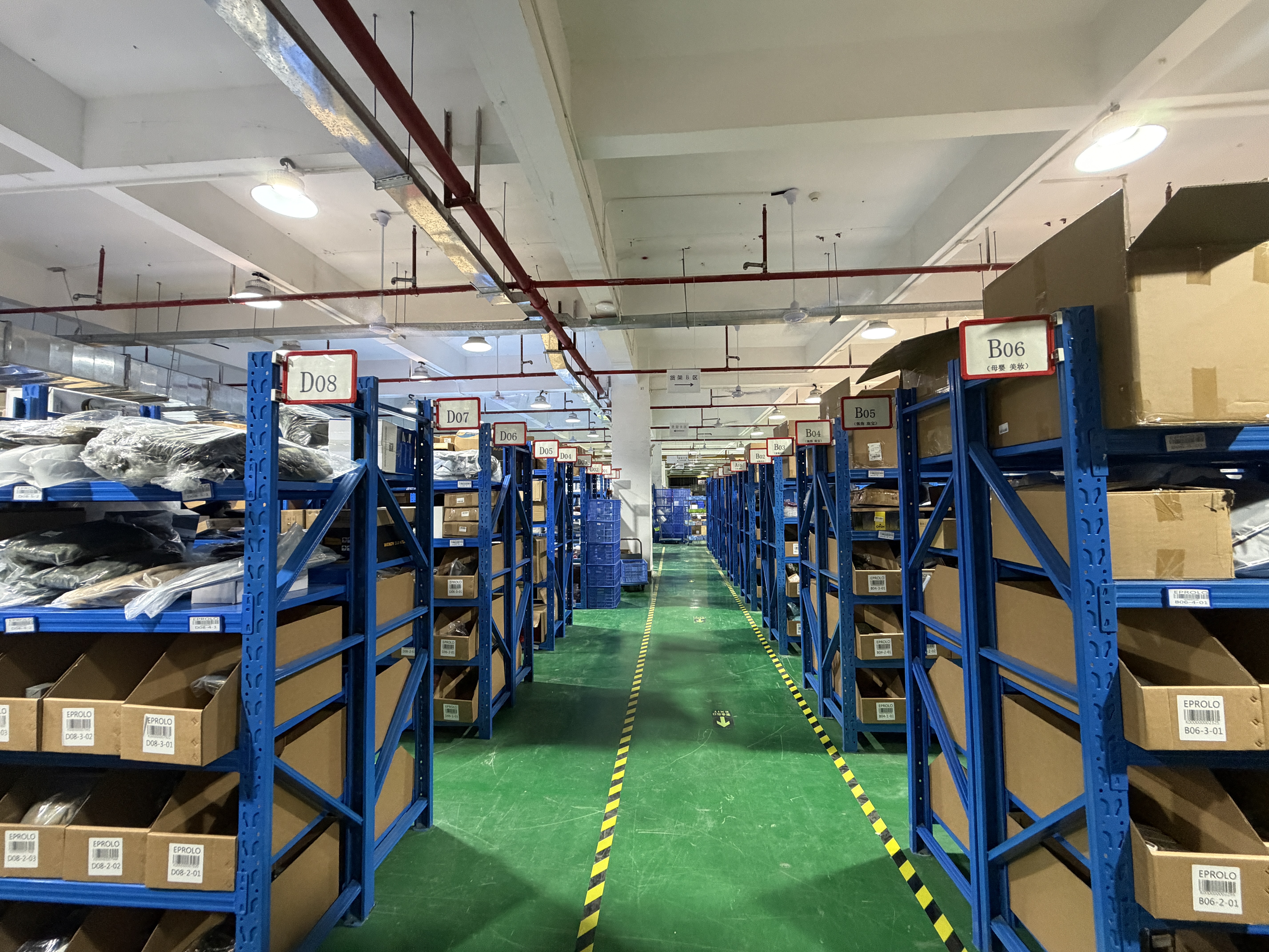 The massive warehouse capacity of the EPROLO Shenzhen Warehouse featuring organized high-density storage racks.