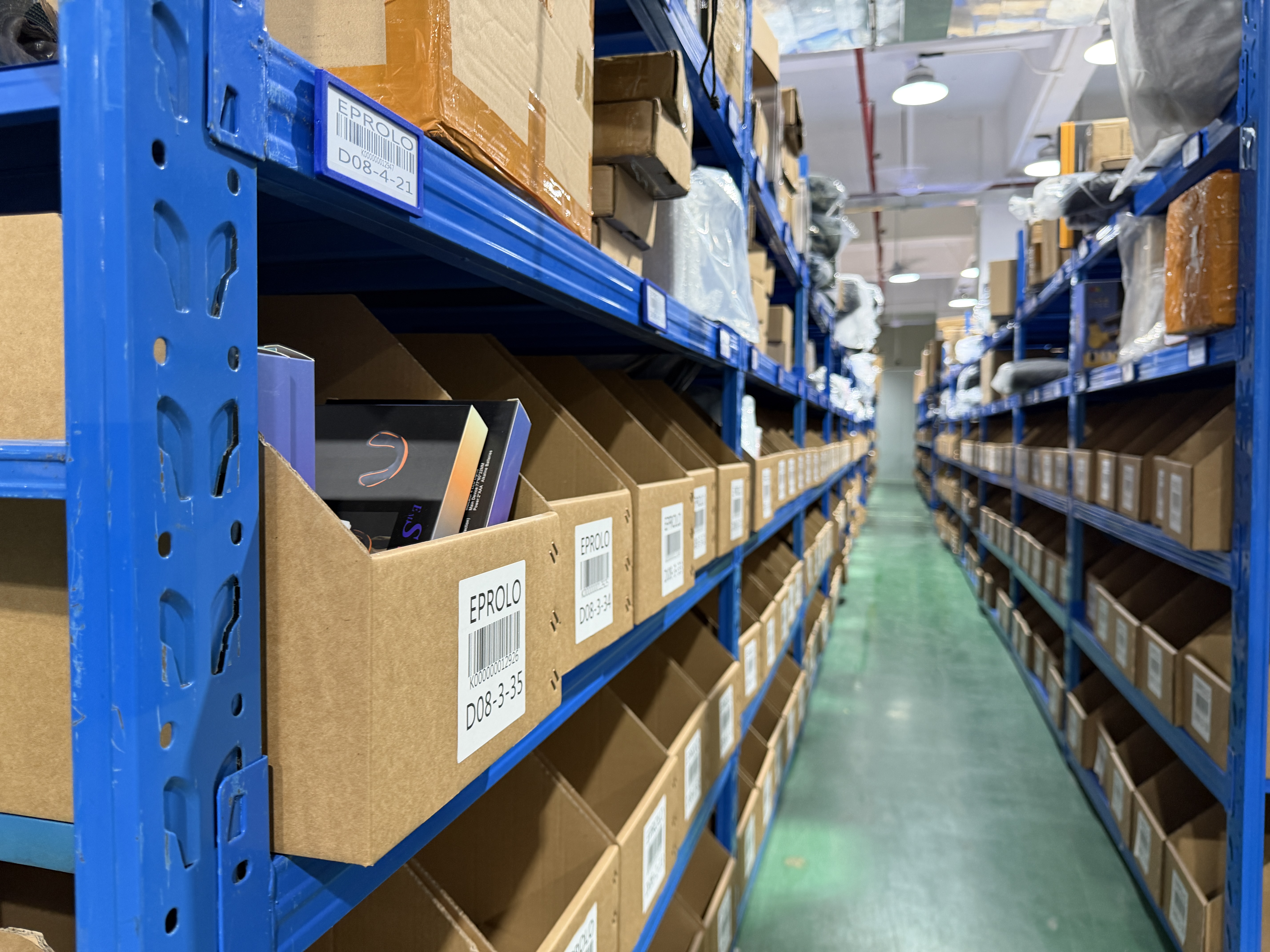 Supporting the global supply chain, EPROLO Shenzhen Warehouse utilizes organized barcode sorting on warehouse racks.