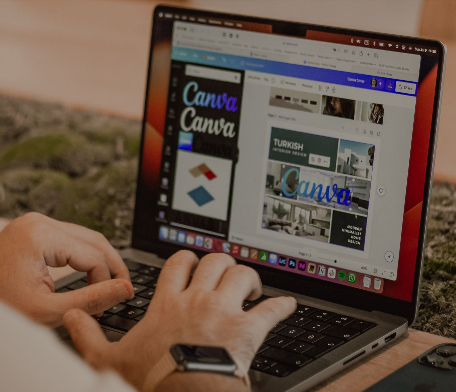 Dropshipping digital products creator typing on a laptop keyboard to edit design templates.