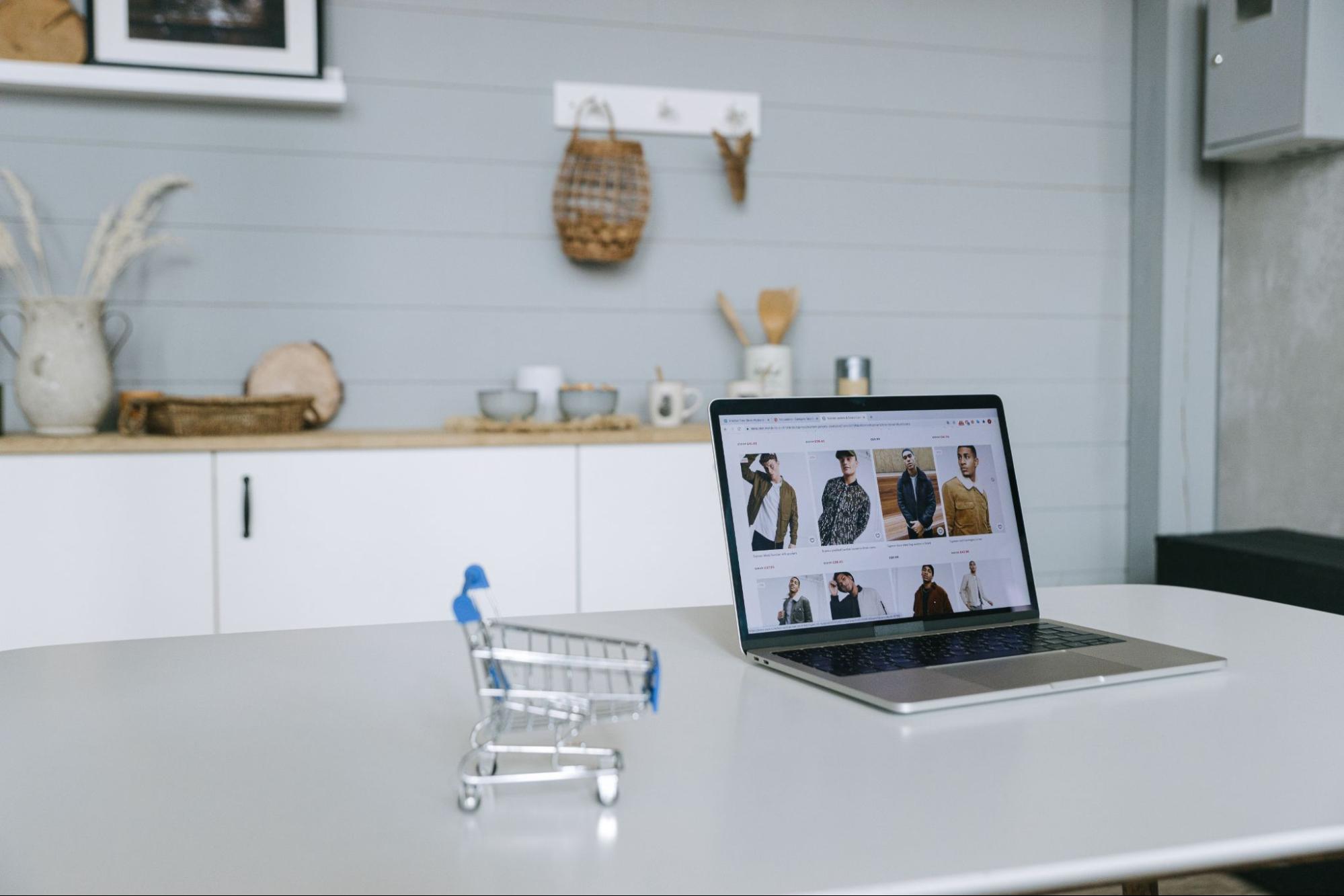 A laptop showing product listings on a clean desk