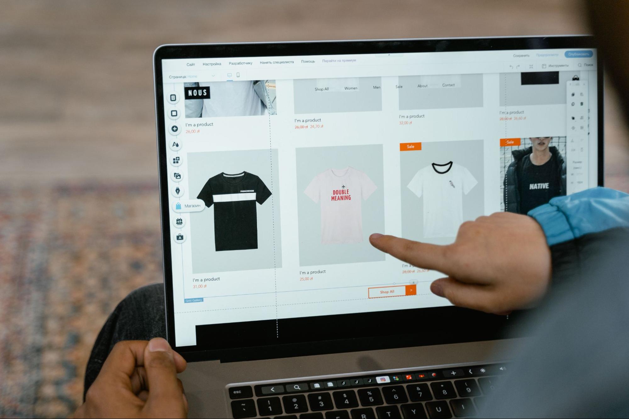 A person managing dropshipping products and orders on a laptop