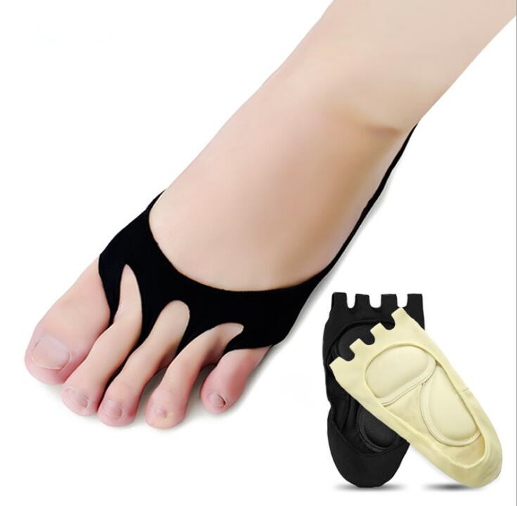 Woman's foot wearing black five-finger compression sock with cream gel insole pads shown separately
