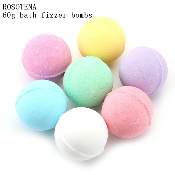 Seven assorted pastel bath bombs with ROSOTENA branding text and 60g weight label