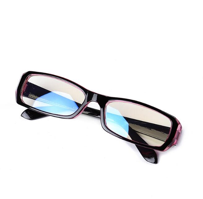 Pink‑tinted frame computer glasses with blue light filtering visible in lenses, showing protection technology