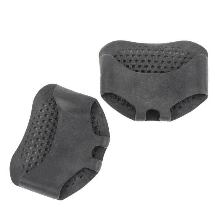Charcoal gray silicone pads demonstrating dark color variant and ventilation design