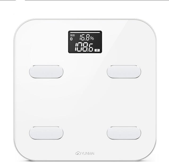 White smart scale displaying 16.8% body fat and 10.1 kg readings on black LCD screen