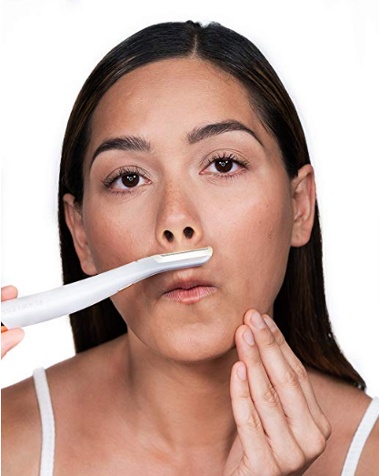 Precision facial tool used beneath the nose