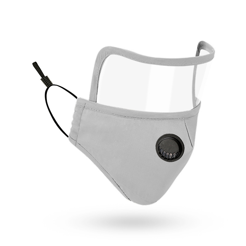 Light grey Lens Mask with integrated clear eye shield and black breathing valve shown at a three‑quarter angle on bright marble