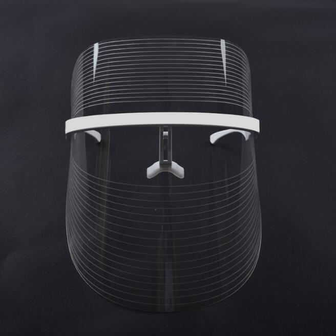Illuminated LED photon facial mask showing advanced light grid and ergonomic silicone design