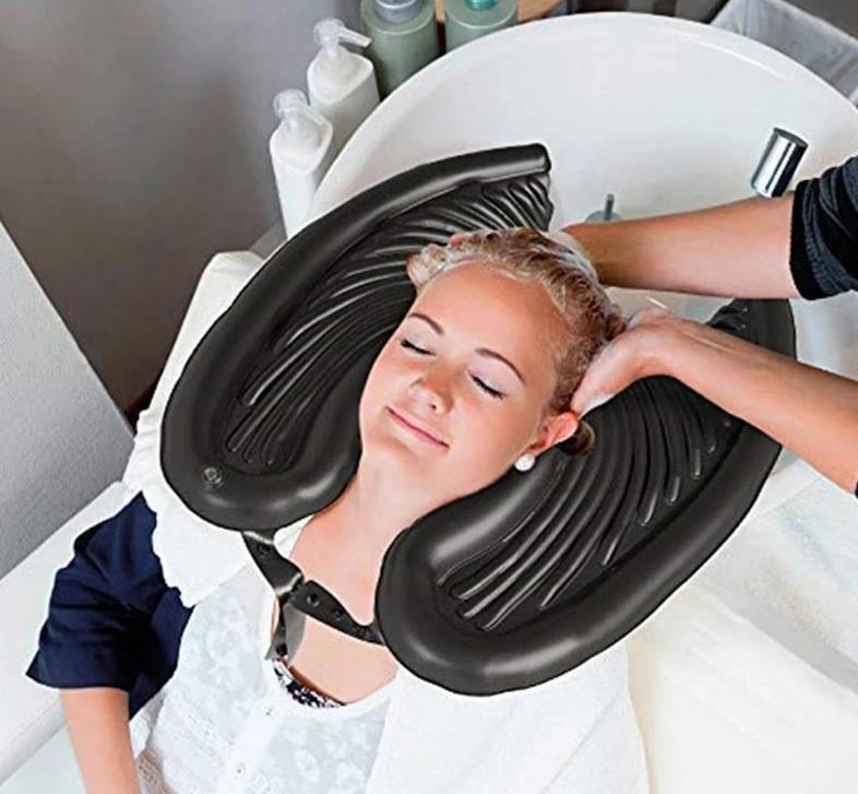 Cushioned neck support used during a comfortable hair wash
