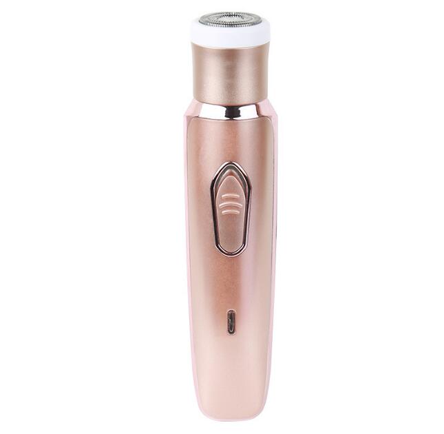 Slim rose-gold handheld shaver with front power button