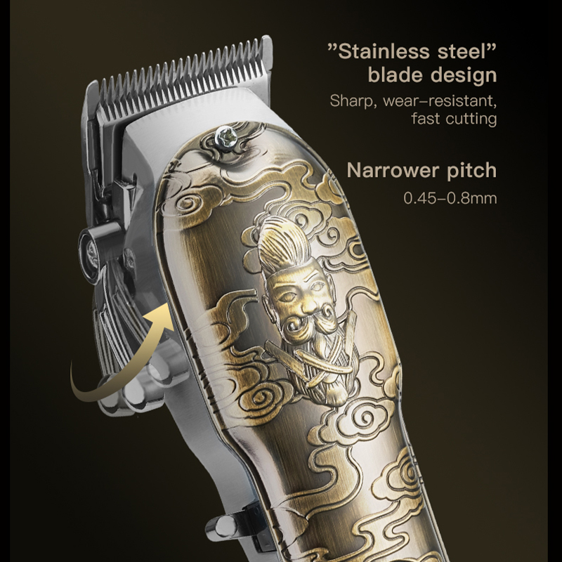 Engraved metal clipper with stainless steel blade close-up