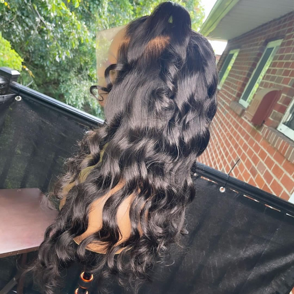 Rear view showing long dense brunette waves and curl consistency