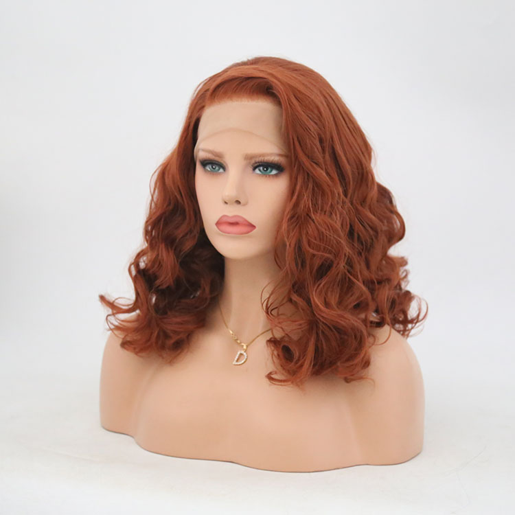 Dense softly defined curls on auburn bob wig