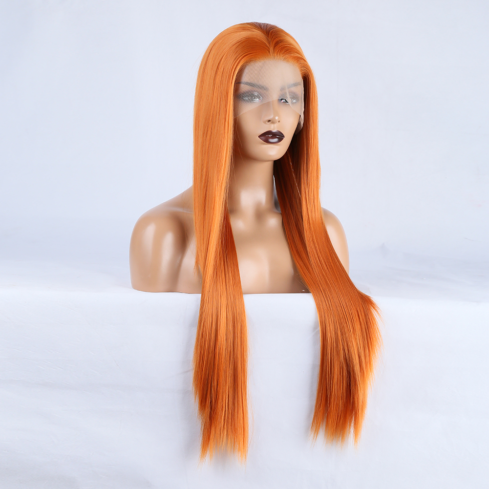 Long straight orange fibers falling over shoulders
