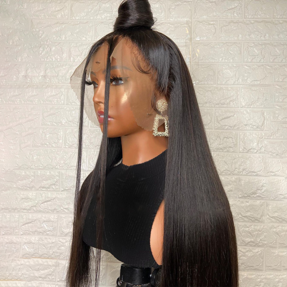 Long black wig arranged into smooth high bun