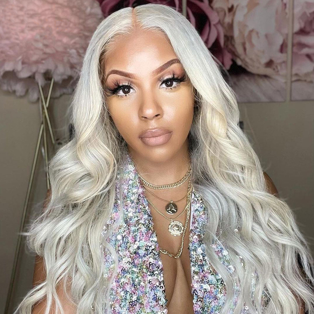 Woman wearing platinum wig for glamorous styling