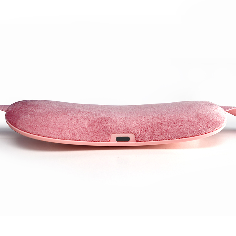 Close-up of the heating belt’s plush fleece interior and USB charging port, emphasizing the thoughtful design