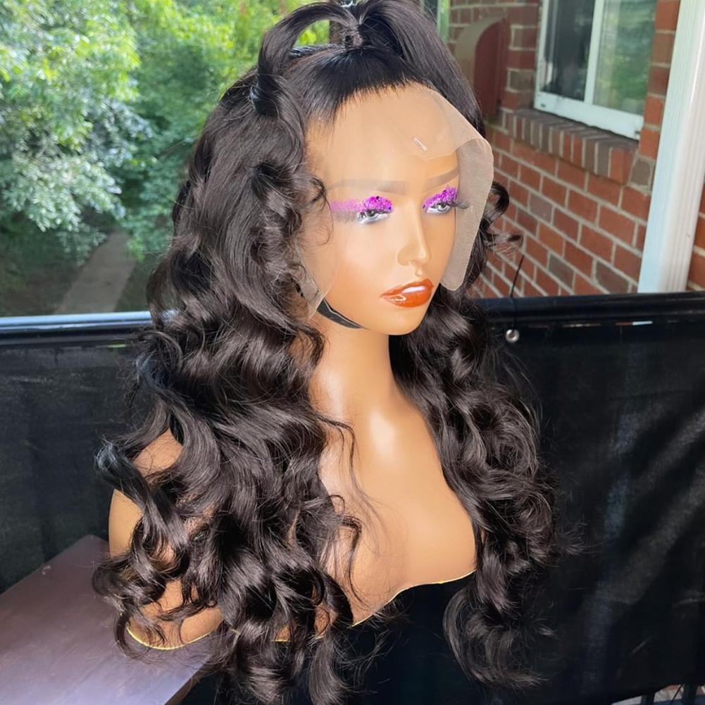 Angled view showing sheer lace front and glossy face-framing curls