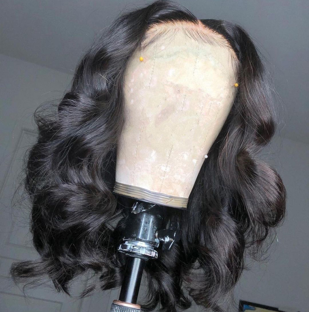 Front lace hairline and pinned curls on dark wig