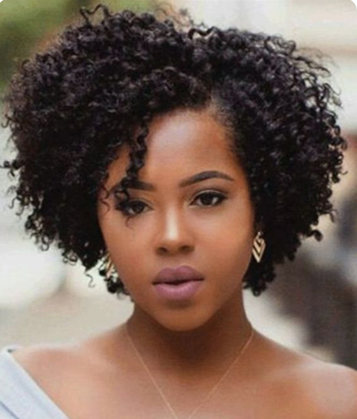 Woman wearing natural textured black wig