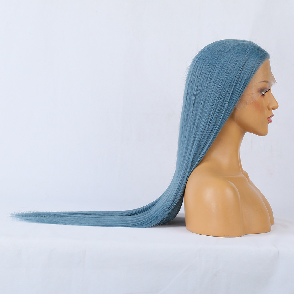 Long blue wig trailing across a light surface