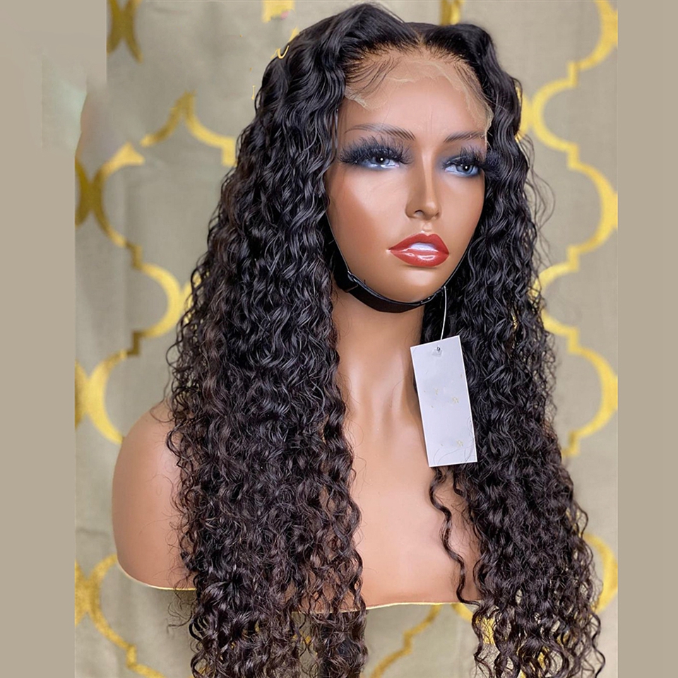 Angled lace-front wig showing center-part hairline and curl fullness