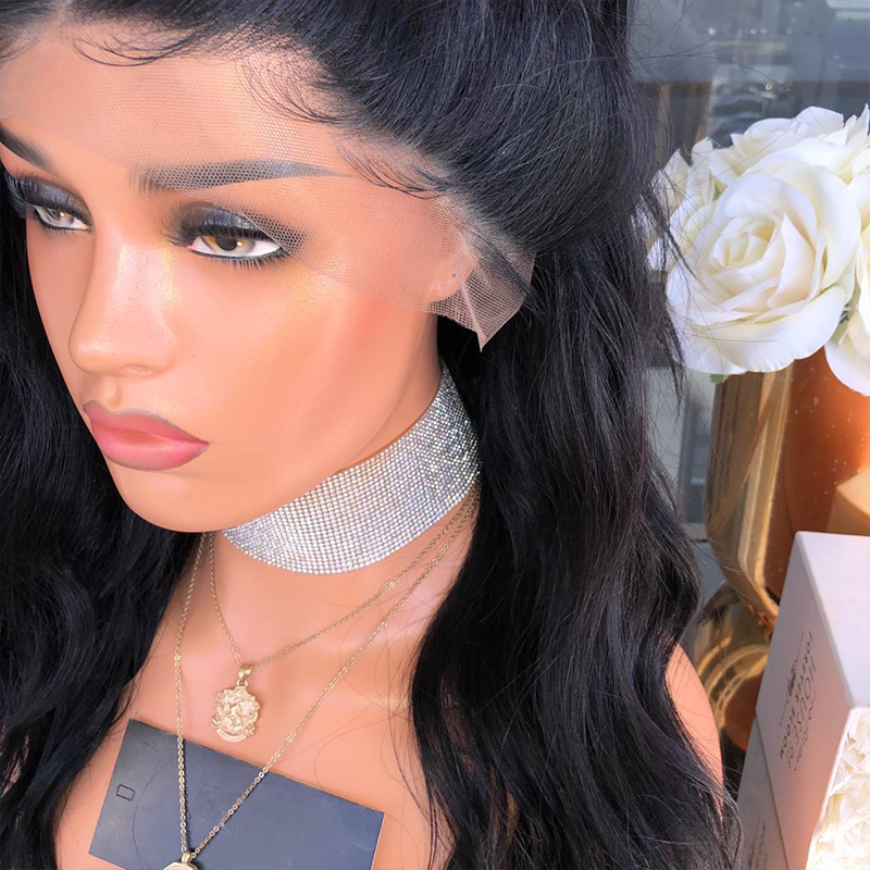 Close-up of sheer lace temple and natural wig hairline