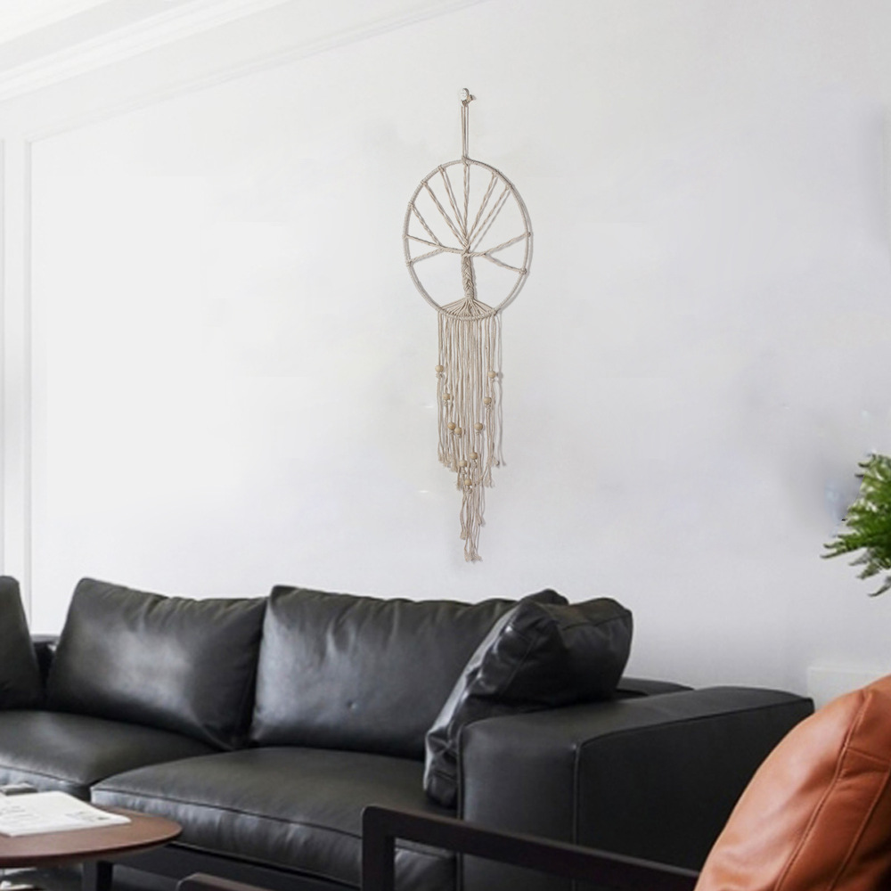 Tree of Life textile contrasting with dark living room sofa