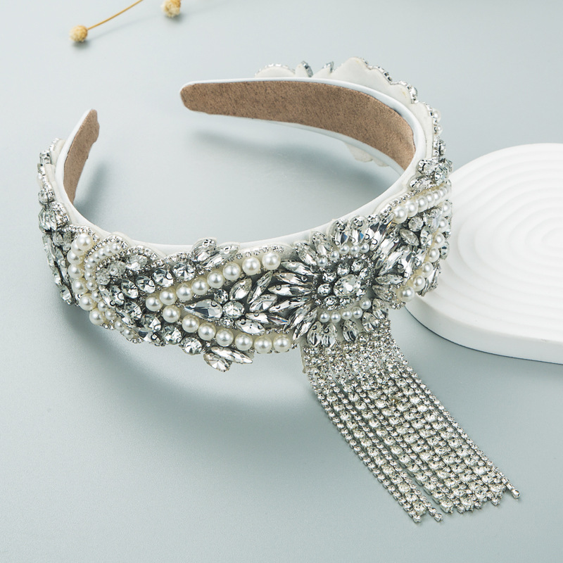 Silver hoop showing pearls rhinestones and crystal fringe