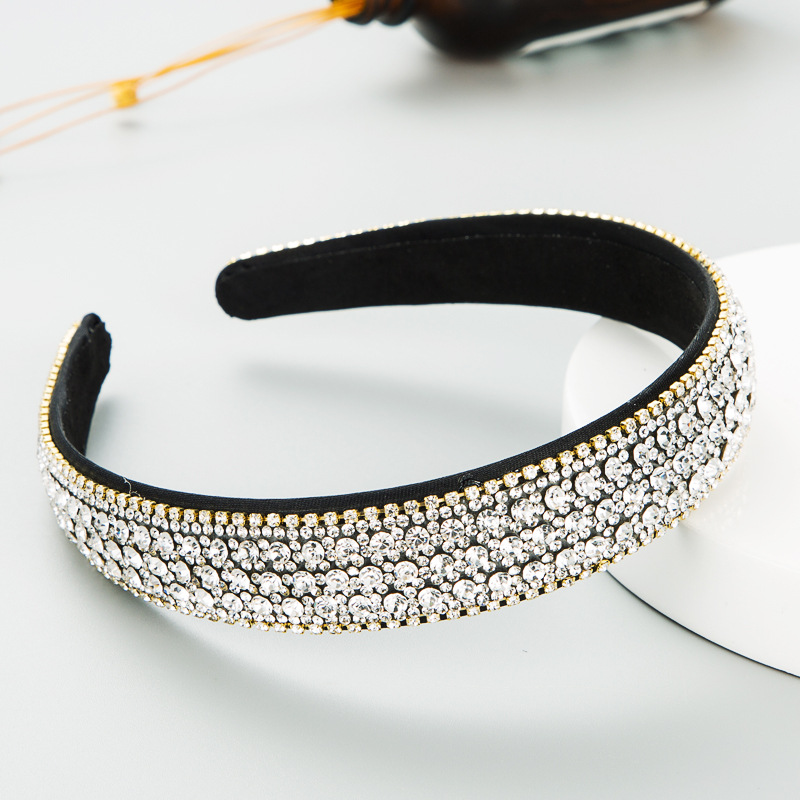 Crystal headband revealing soft black inner lining