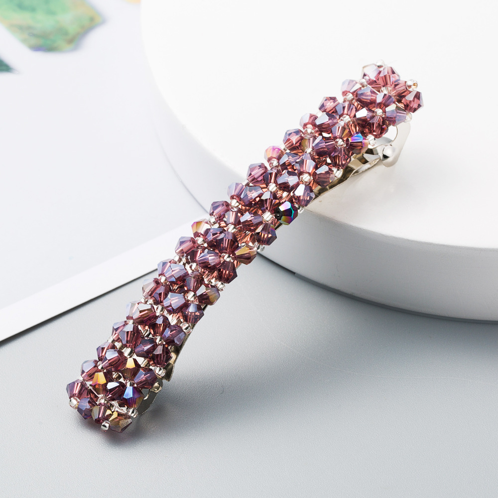 Rose purple clip showing dense decorative bead arrangement