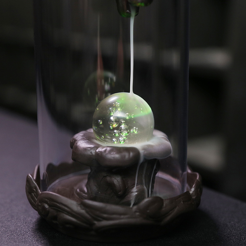 Upgrade your incense game with our Purple Sand Dragon Backflow Incense Burner. This beautiful burner features a unique design that releases a downward flow of smoke, creating a mesmerizing and relaxing ambiance. Perfect for meditation, yoga, or simply unwinding after a long day.
