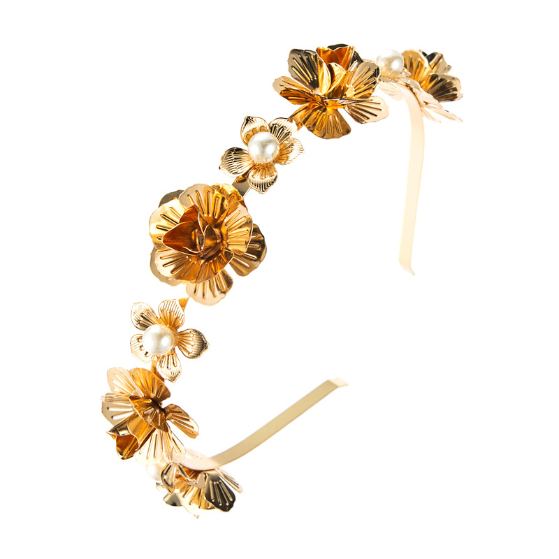 Layered golden flowers with luminous white faux pearls