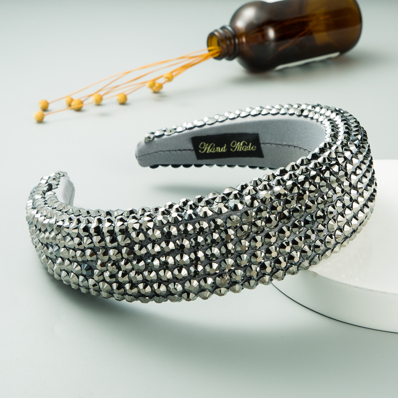 Close view of reflective embellished headband surface