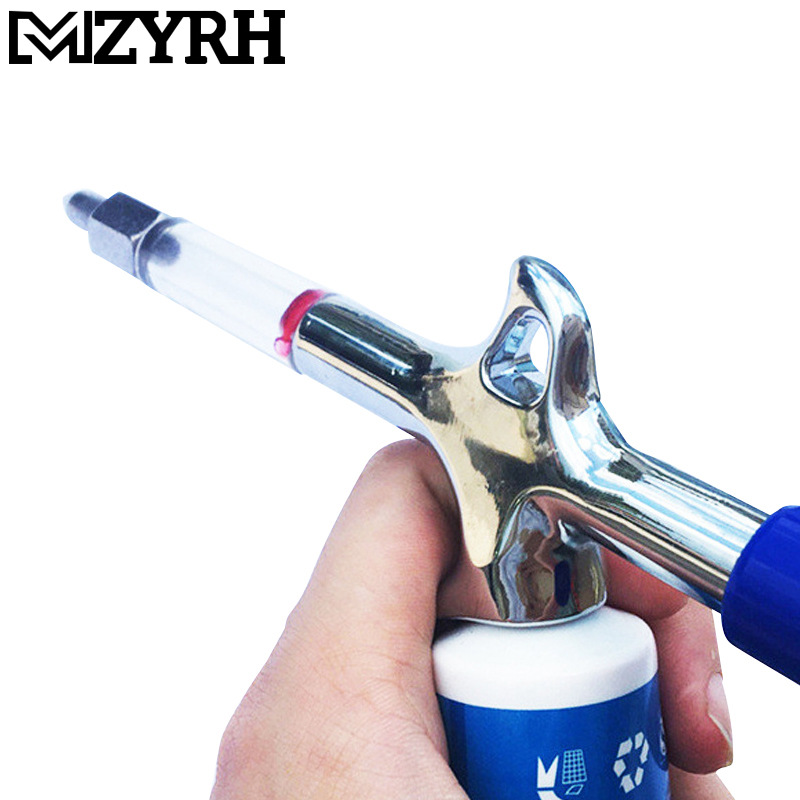 Mini bomba de lubricación para bicicleta, color cromo plateado