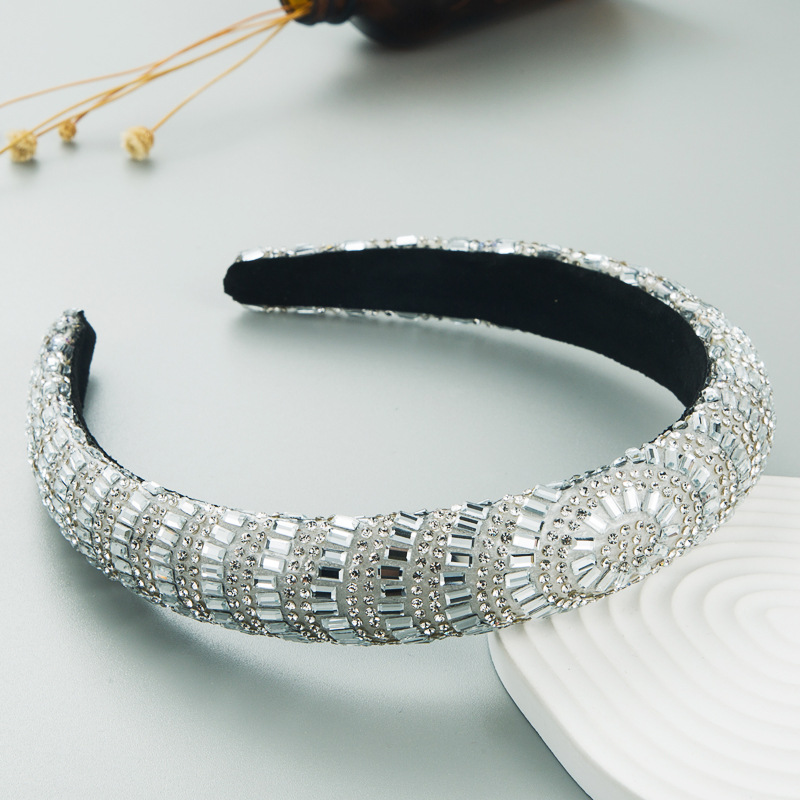 Silver padded hoop with soft inner lining visible