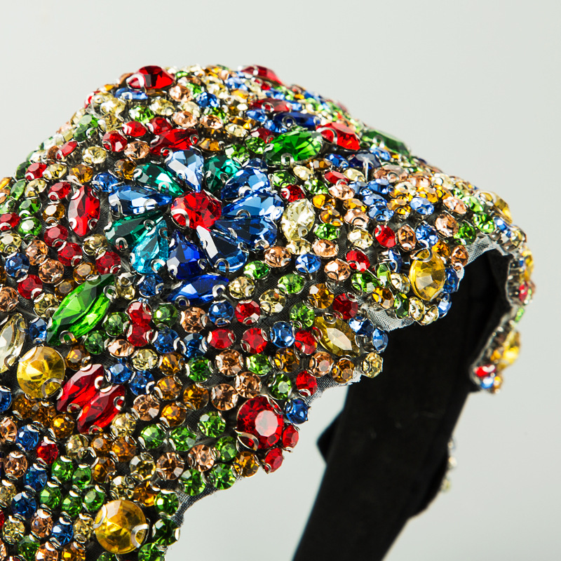 Dense ruby sapphire emerald rhinestone surface