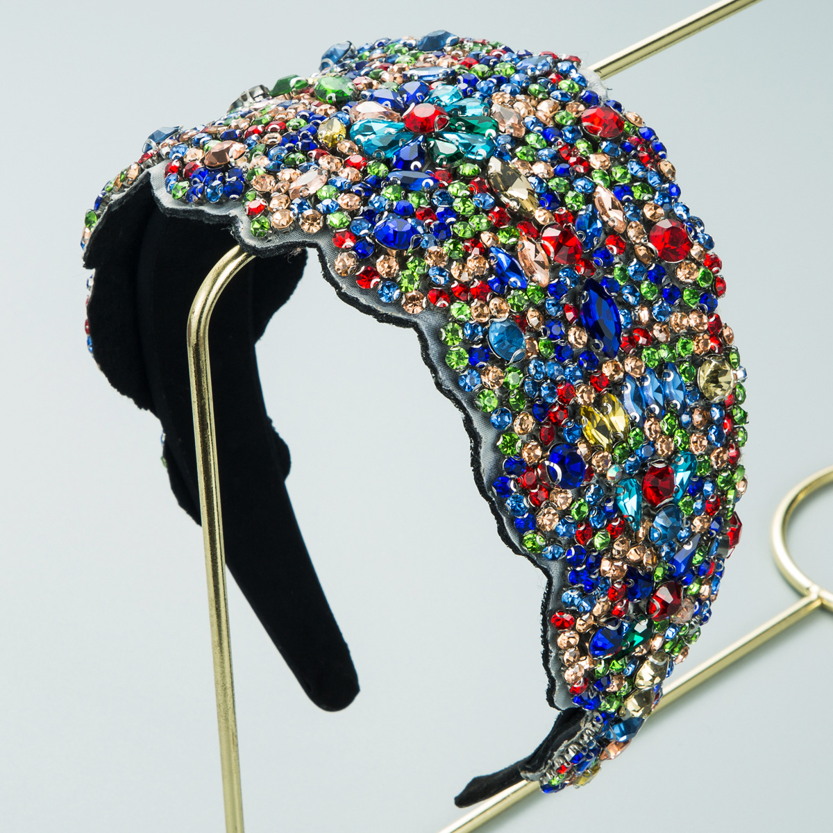 Curved crown with edge-to-edge rhinestone decoration