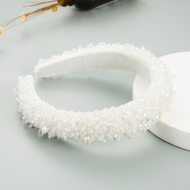 Faceted crystal beads catching warm light