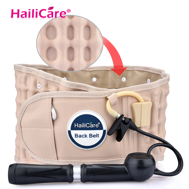 Beige inflatable back support belt with hand pump and carrying handles on clean white background