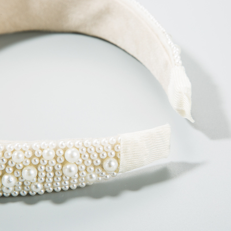 Soft fabric-covered interior and padded band end