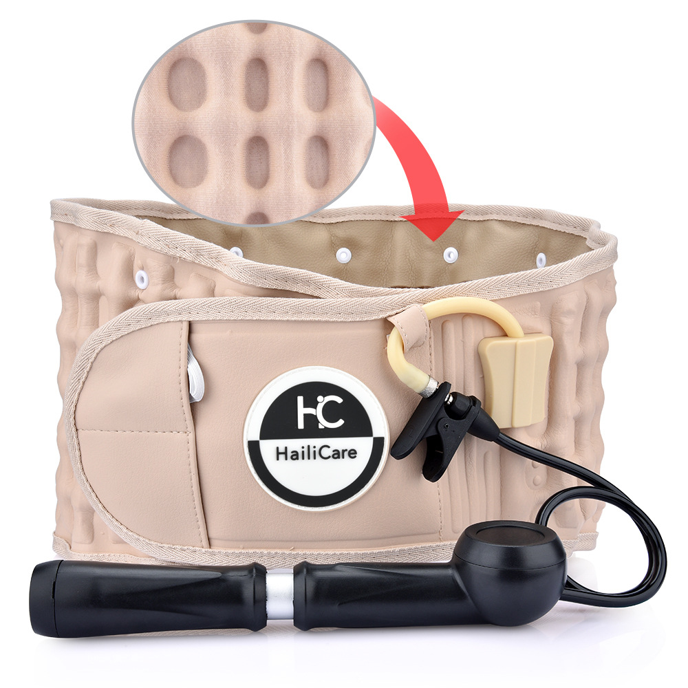 Close-up of beige inflatable back belt with embossed air columns and pump, showing medical-grade construction