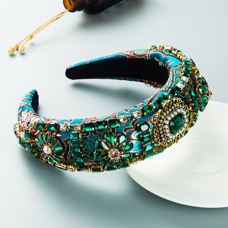 Teal hoop side profile with padded fabric and black lining