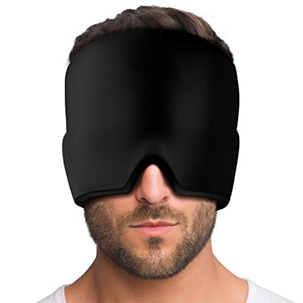 User adjusting elastic head strap of gel mask while seated, demonstrating hands-free wearability