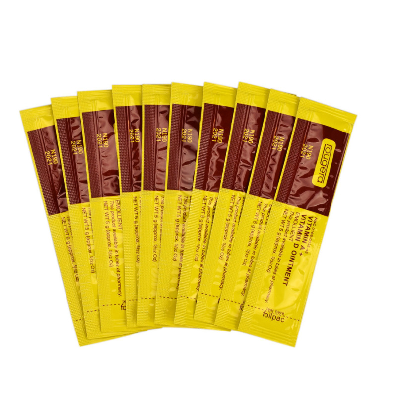 Yellow and burgundy variant packets fanned showing alternative product line or fragrance option