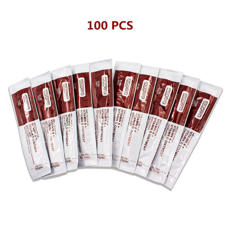 100-pack of tattoo aftercare sachets fanned in arc formation showing burgundy and white packets