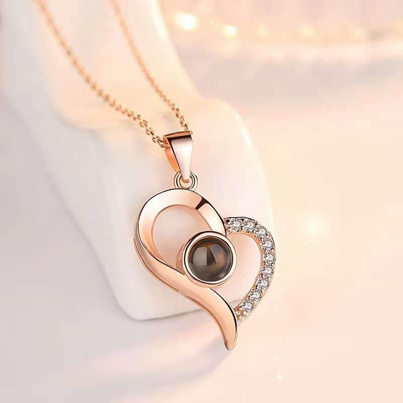 This unique necklace features a romantic message that can be read in 100 different languages, allowing the wearer to express their love in a truly special way. It is made of premium-grade materials and is hypoallergenic, making it a safe and luxurious gift for the special someone in your life.