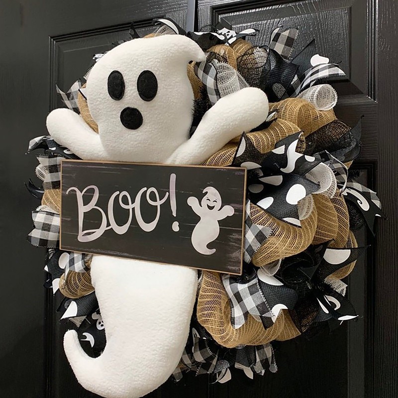 Add a spooky twist to your Halloween decor with this Cute Halloween Ghost Boo Wreath. Featuring playful ghost accents and a bold "Boo" message, it captures the fun and eerie spirit of the season, making your entrance unforgettable.
