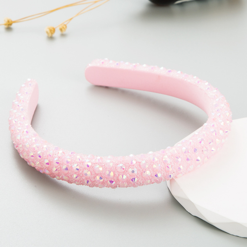 Blush pink padded headband with smooth structured curve
